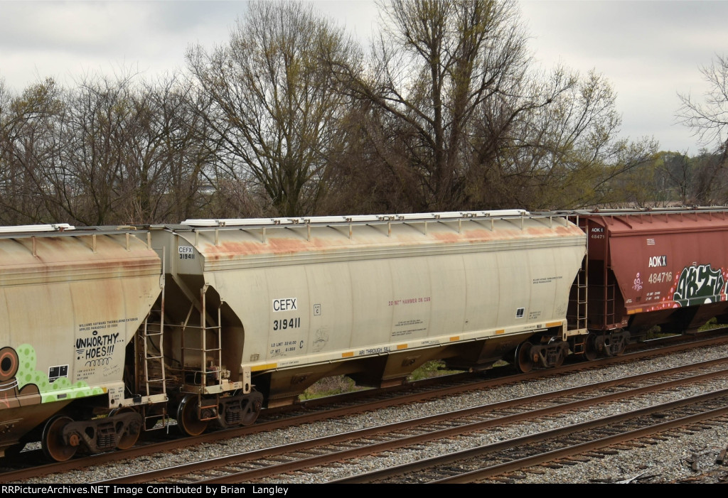 319411